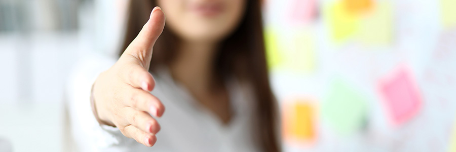 Woman offering a handshake