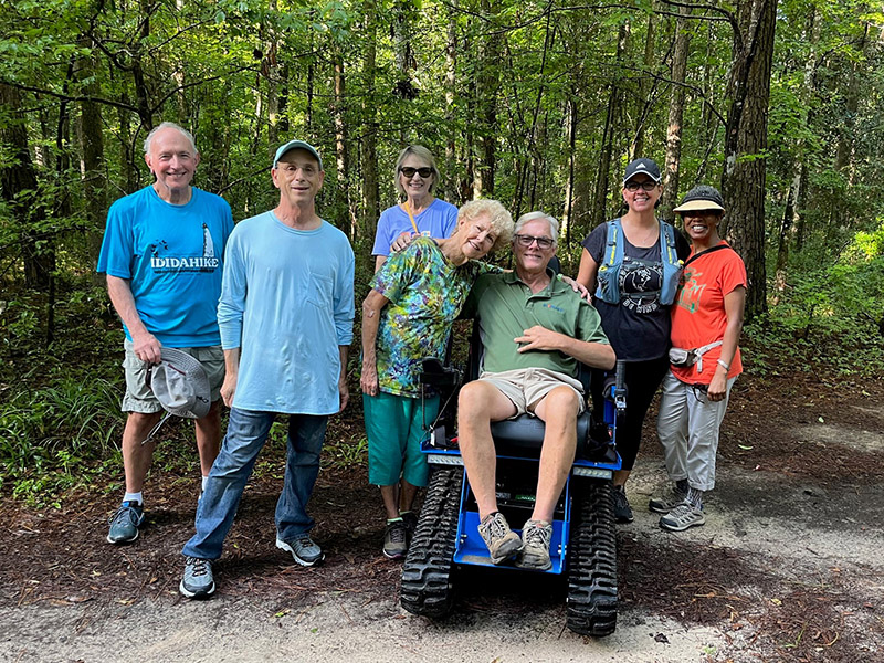 A group of seniors enjoying a hike.